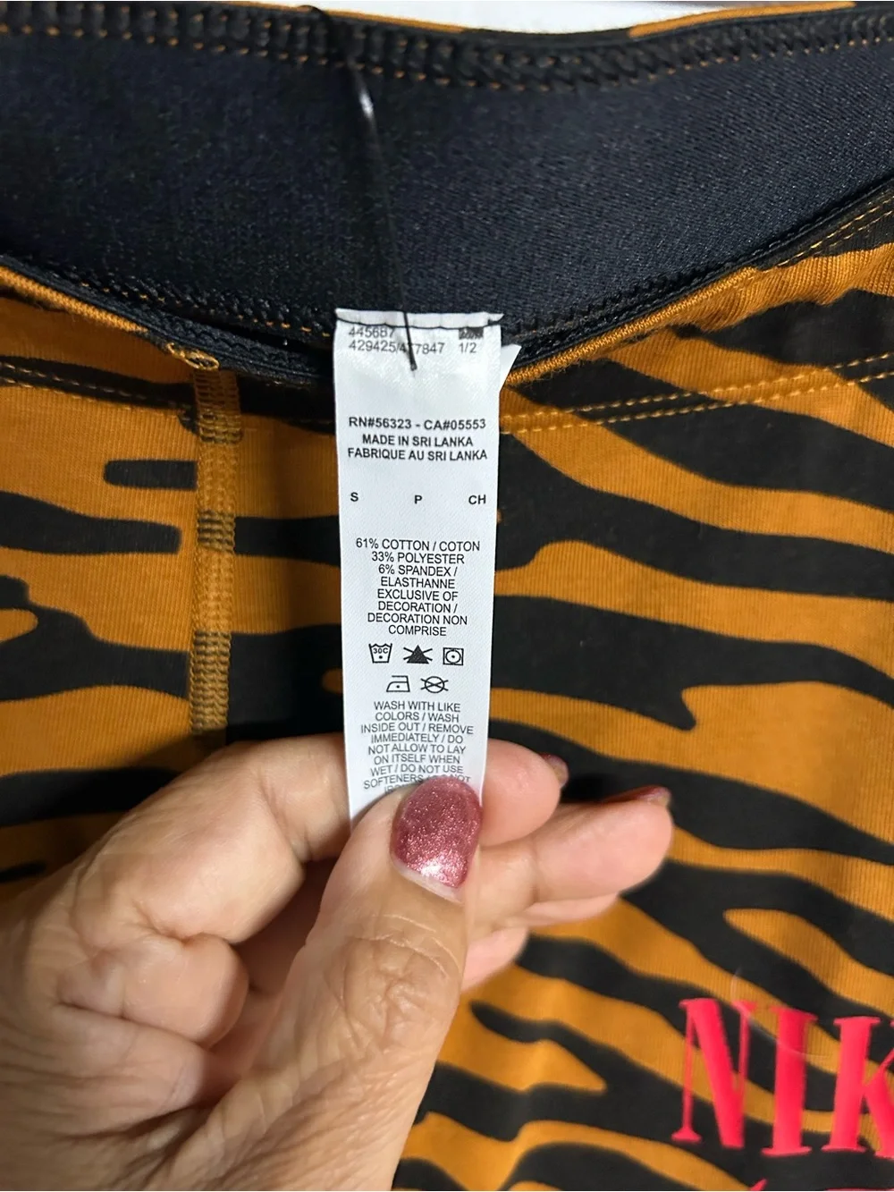 Nike Brown and Black Tiger-Print Women’s Leggings with Pink Logo